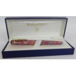 A marbled finish Waterman fountain pen with paperwork, reservoir, cartridge and box. Condition