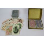 A full set of Panama Canal souvenir playing cards c1926 in box, plus a double pack of Guinness