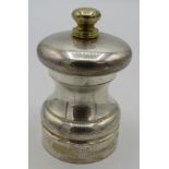 A silver 'Peter Piper Super Salt Mill', London 1998, approx 3" high, boxed. Condition report: Slight