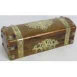 A 19th century dome topped walnut glove box with ornate brass studded mounts and cross banded