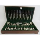 A 71 piece 8 setting silver plated canteen of cutlery in Dubarry pattern. Fitted in a wooden