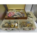 A large collection of vintage jewellery contained in two boxes. Condition report: Some age related