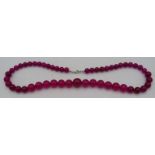 Onyx gemstone necklace, 20" length, graduated polished beads, largest 15mm approx. Condition report: