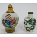 An antique Japanese porcelain snuff bottle decorated with an erotic scene plus a similar Chinese