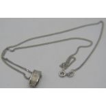 A 'Hot Diamonds' 925 stamped pendant set with a small diamond on a 9ct white gold chain, boxed,