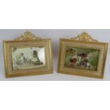 A pair of good quality antique French gilt picture frames on easel stands and with convex glass.