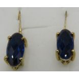 Midnight blue quartz gemstone earrings, marquise faceted stones, lever back. Yellow gold over