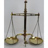 A set of 19th century H. M. Stanley brass balance scales. Height 53cm. Width 48cm. Condition report: