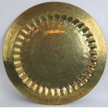 A large hand decorated Indo-Persian brass tray will central floral medallion. Diameter 58cm.