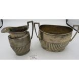 A Victorian silver cream jug & sugar bowl with 1/2 fluting decoration, Sheffield 1886, James Dixon &