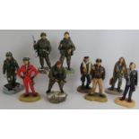 Nine limited edition Ashmor porcelain military figurines including Red Arrows, Gurkhas, Royal
