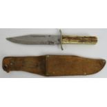 A vintage Japanese made 'Original Bowie Knife' with antler handle and leather sheath. Blade