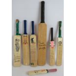 Seven mini souvenir autographed cricket bats, four signed by Sachin Tendulkar. Others for India,