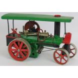 A vintage Wilesco 'Old Smoky' model traction engine, live steam with burner. Length 33cm. Height