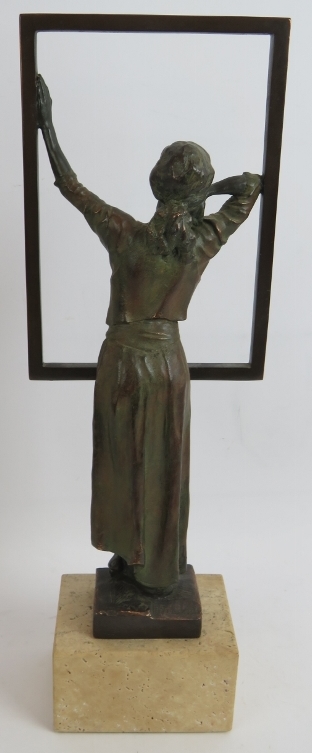 A contemporary bronzed sculpture of a woman at a window mounted on a stone plinth. Signed Miro, - Image 3 of 5