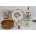 Seven pieces of Poole Pottery including a table lamp, vases, candlestick and bowl. Lamp 30cm