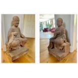 A pair of superb rare, and large Chinese carved red sandstone Temple Figures of Guardian Monks,