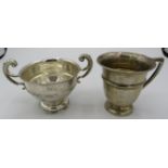 A silver christening cup, Birmingham 1931 and a silver two handled trophy cup, Sharman D Neill