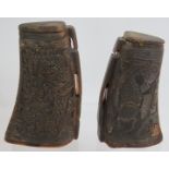 A pair of Chinese carved buffalo horn libation cups one with dragon designs and one with koi carp.