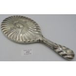 A large good quality silver backed hand mirror with bevelled glass, Birmingham 1890. Condition