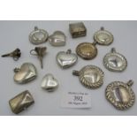 A collection of four silver pill boxes, eight scent bottles and two perfume funnels, all