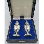 A pair of silver pedestal salt & pepper pots, Birmingham 1996, approx weight 2 troy oz/66 grams,