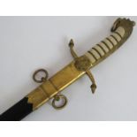 A George V ceremonial naval short sword and scabbard. Gilt brass fittings, wired shagreen hilt and