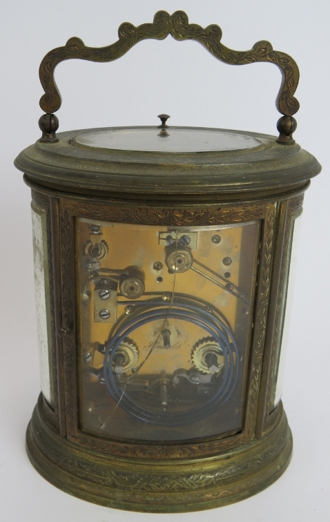 A good quality 19th century gilt brass repeater carriage alarm clock in ovoid engraved case. No - Image 3 of 7