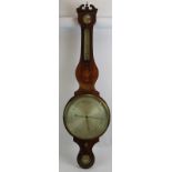 An early 19th century over-sized wheel barometer by Lacy of London. Inlaid mahogany case, silvered