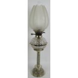 A fine quality late 19th century silver plated oil lamp by Hukin and Heath. Chased acanthus design