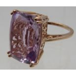 A large pink amethyst cocktail ring, faceted cushion cut 18mm x 13mm, size N/O, rose gold/925.