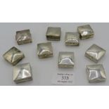 A collection of ten small square silver pill boxes, marked 925, approx weight 3 troy oz/93 grams.