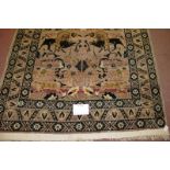 An unusual design Eastern rug depicting lions hunting. Some wear to fringe. 180cm x 116cm (
