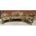 An antique French three-piece salon suite, comprising two giltwood open-sided armchairs and a two-