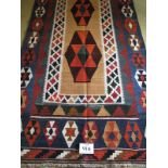 A fine Qashqai Kilim rug strong vibrant colours and in excellent condition. 253cm x 127cm.
