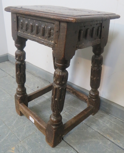 A fine late 16th century Elizabethan oak joint stool in unrestored condition, with carved frieze, o - Image 2 of 3