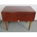 An early Victorian mahogany Pembroke table, with single drawer and dummy drawer, on tapering