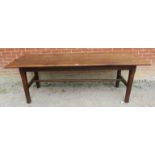 An 18th century elm kitchen/dining table, with pull-out oak chopping board, on chamfered square