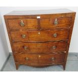 A Regency Period mahogany bow fronted chest of two short over three long graduated cock-beaded