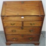 An 18th century mahogany bureau, the fall front opening onto a fitted interior with document safe