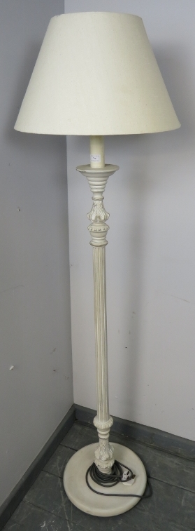 A vintage oak English made standard lamp, painted distressed white, with acanthus carved and