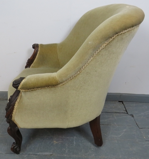 A 19th century mahogany framed parlour chair, with acanthus carved and scrolled arms, upholstered in - Image 4 of 4