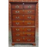 A Georgian medium oak chest on chest featuring Greek key cornice and crossbanded inlay, of two short