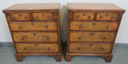A pair of 18th century and later burr walnut flip-top bachelor’s chests, crossbanded and featuring