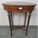 An Edwardian mahogany and walnut oval occasional table, crossbanded and inlaid with satinwood and