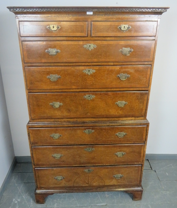 A fine George II burr walnut chest on chest, crossbanded and strung with boxwood and satinwood, also