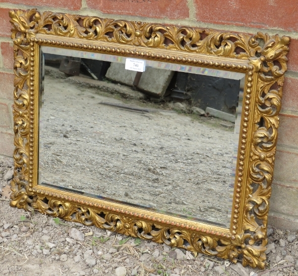 A 19th century rectangular Florentine mirror, the gilt frame with beaded edging and pierced acanthus - Image 2 of 2