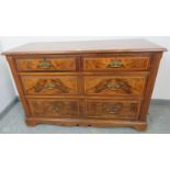 An Edwardian burr walnut chest of two short over two long drawers, crossbanded and strung with