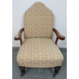 A late Victorian camelback low open sided armchair, upholstered in a patterned material depicting