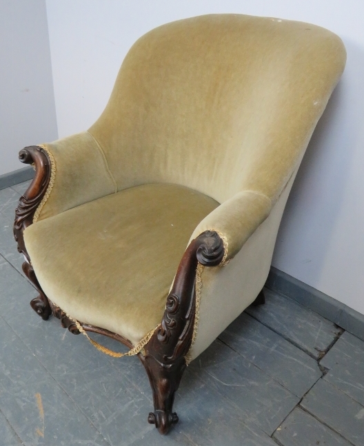 A 19th century mahogany framed parlour chair, with acanthus carved and scrolled arms, upholstered in - Image 2 of 4